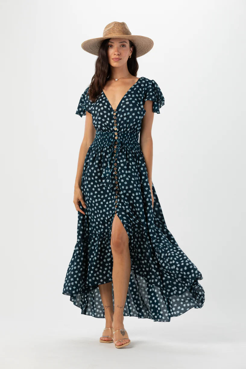 New moon maxi dress in ditsy daisy sea front view