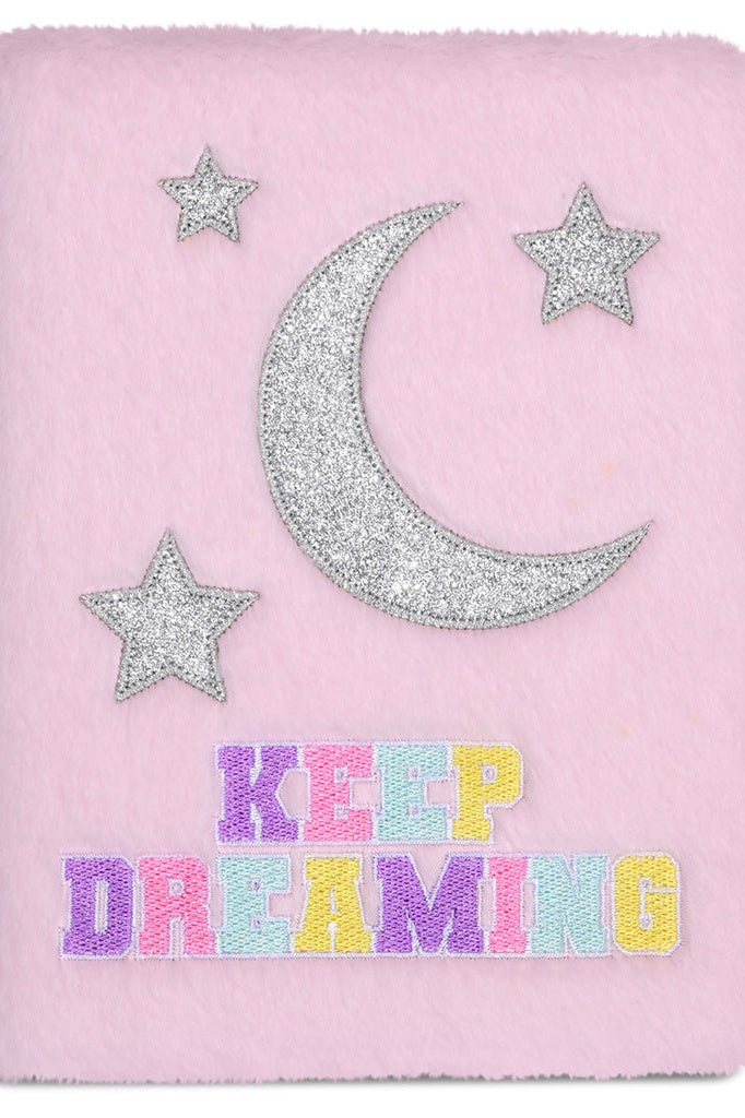 Pink furry journal cover with silver moon and stars, plus “KEEP DREAMING” text