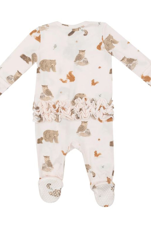 White animal-print baby footie romper with ruffle detail at the waist and dotted foot pads