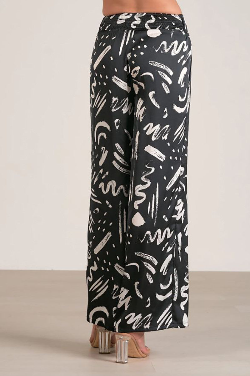 Elastic waistband pant in black abstract back view