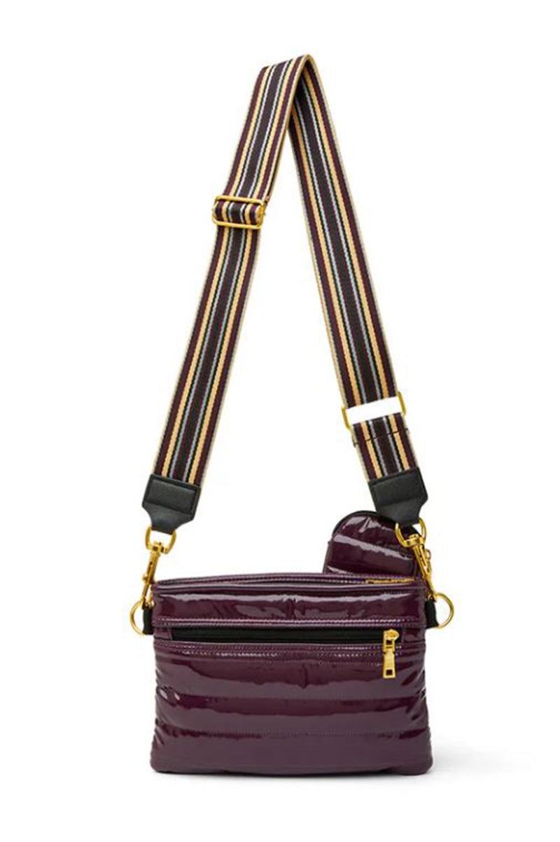 Downtown crossbody in abergene patent back view