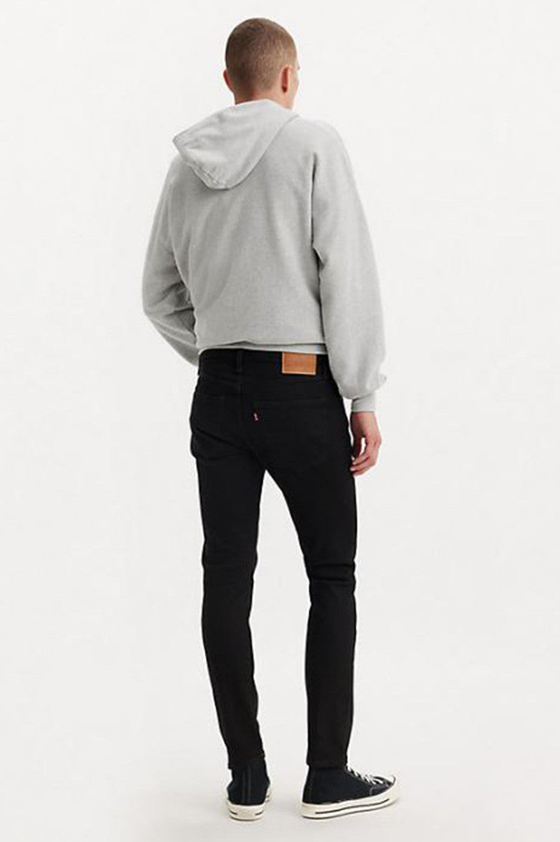 512 SLIM TAPER FLEX JEANS IN BLACK LEAF BACK VIEW