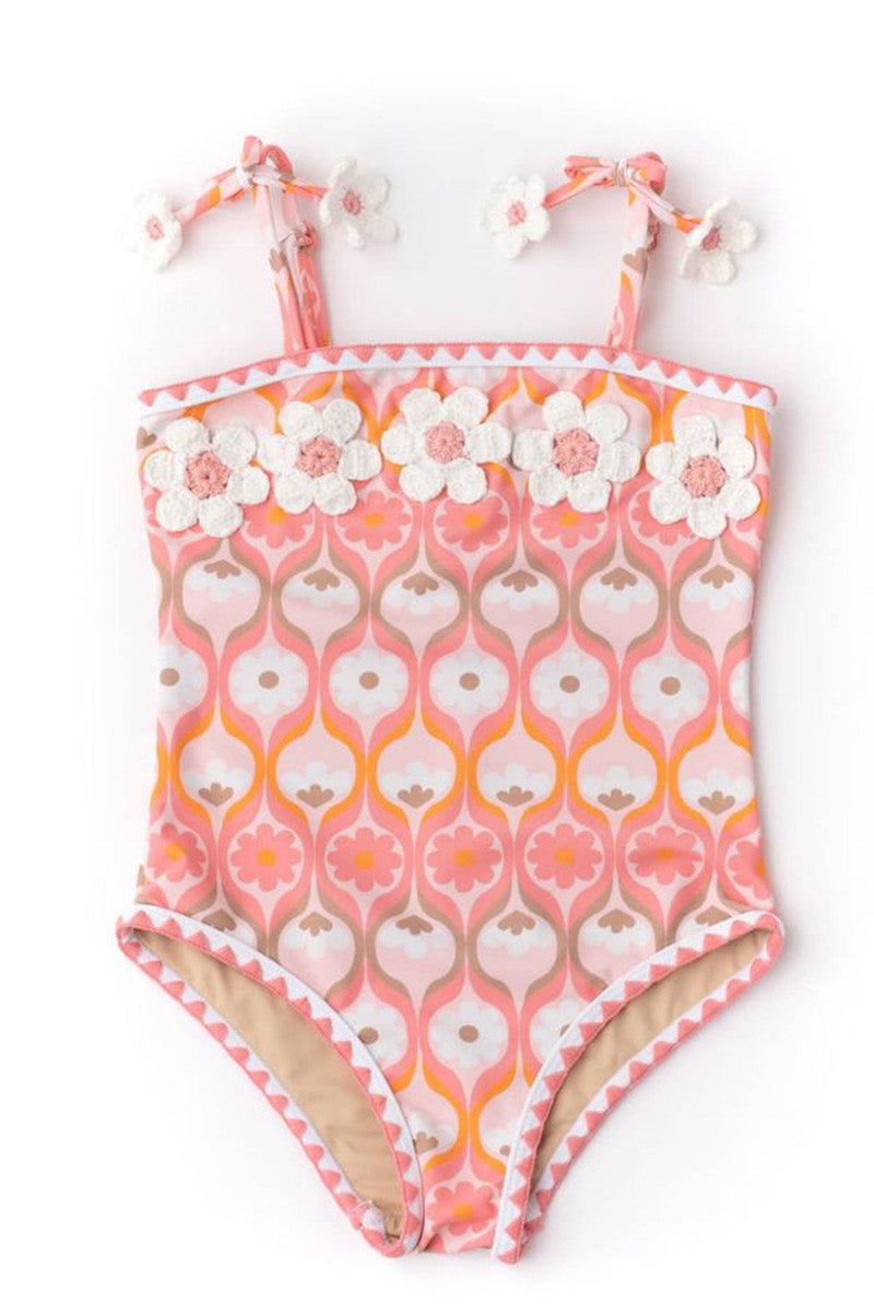 Crochet pom pom one piece in summer sorbet front view