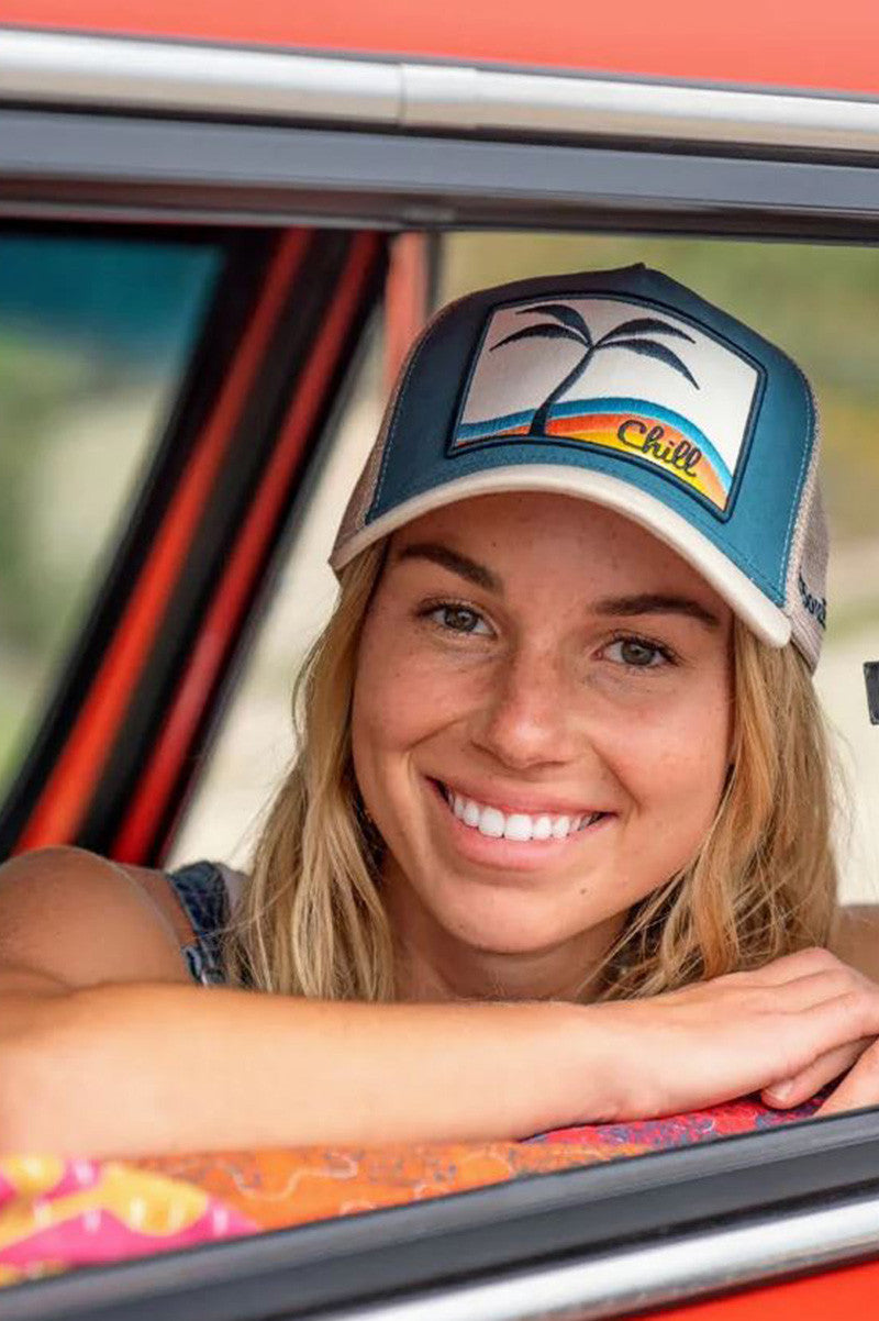Chill trucker hat in tan and teal style view
