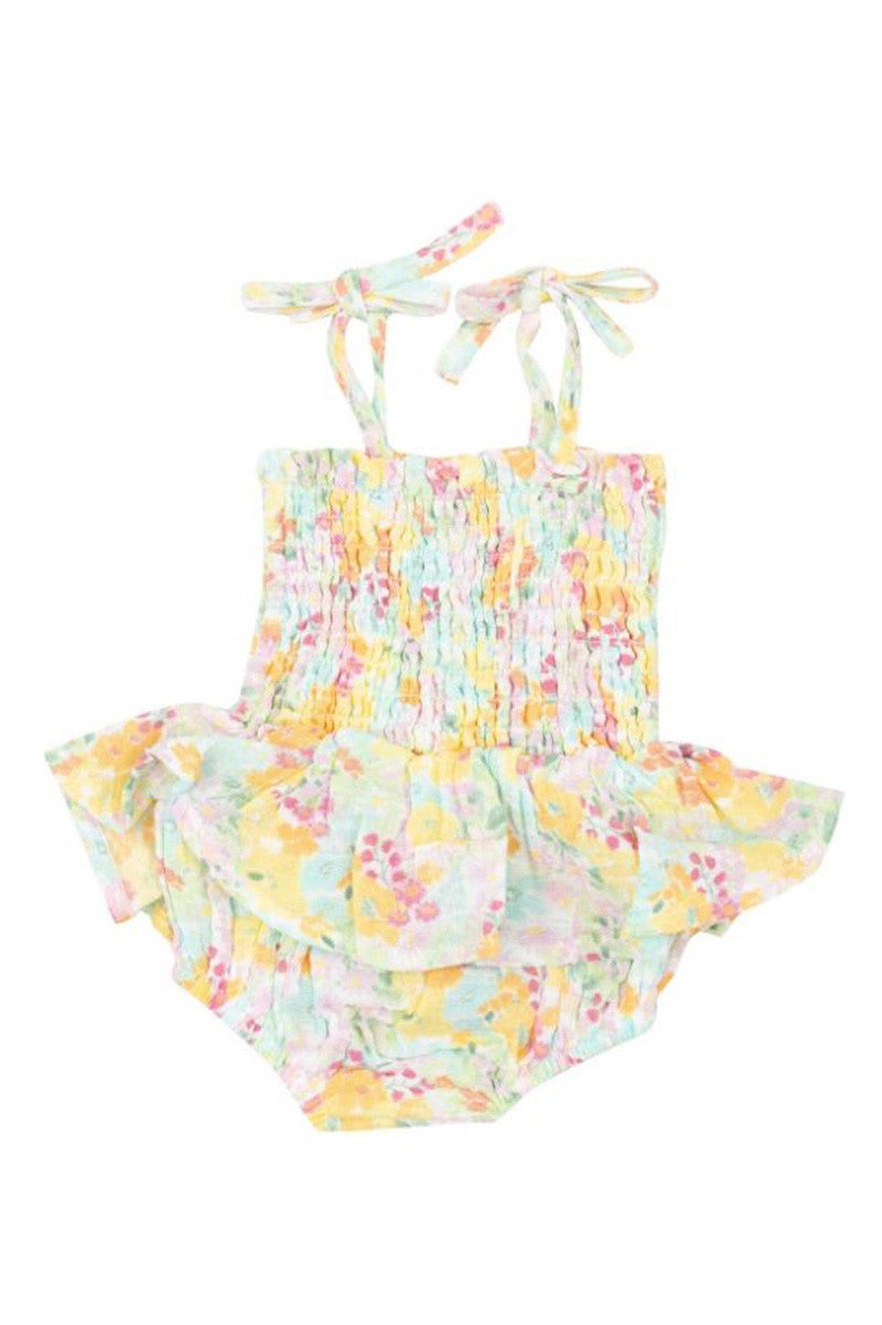 Smocked bubble with skirt in spring meadow back view