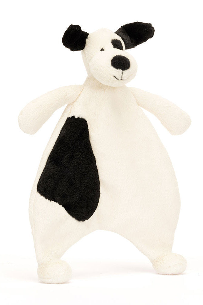 Black-and-cream puppy comforter plush with floppy ears and large stitched nose