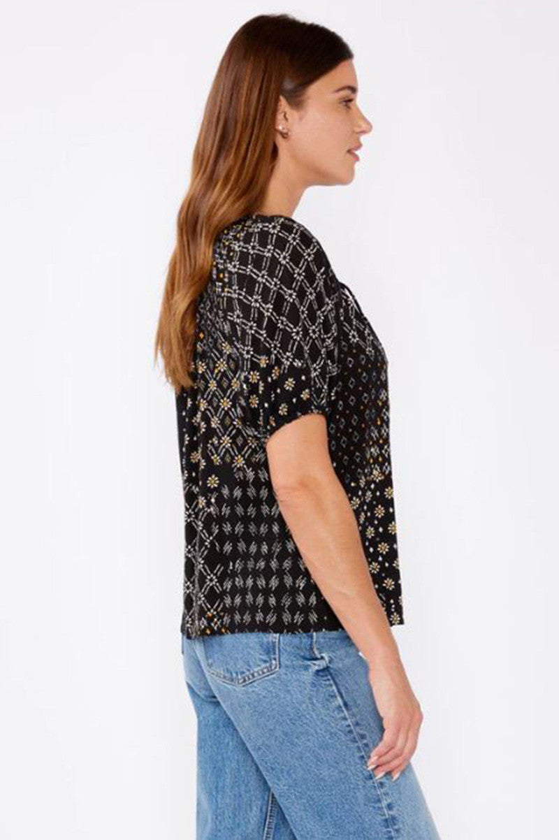celestial garden puff sleeve top in black/gold side view