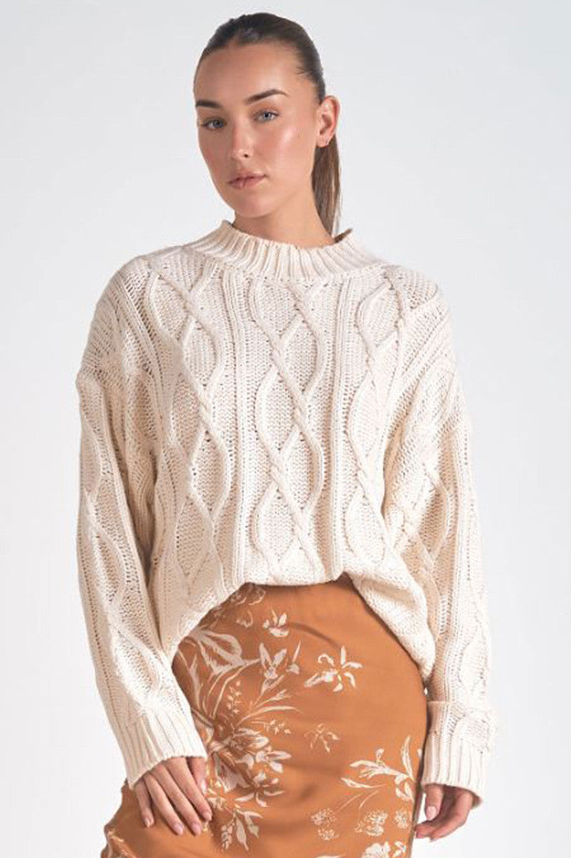 cable knit crewneck sweater in off white front view