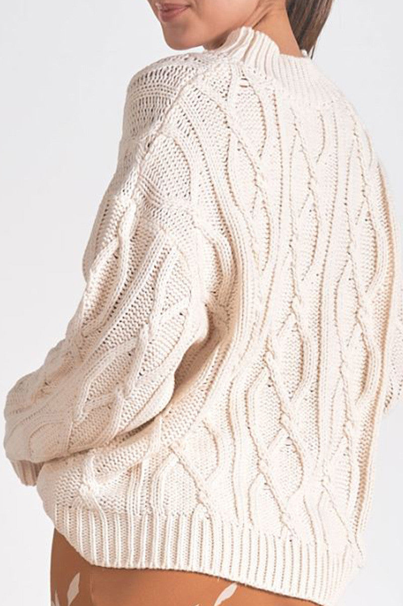 cable knit crewneck sweater in off white back view