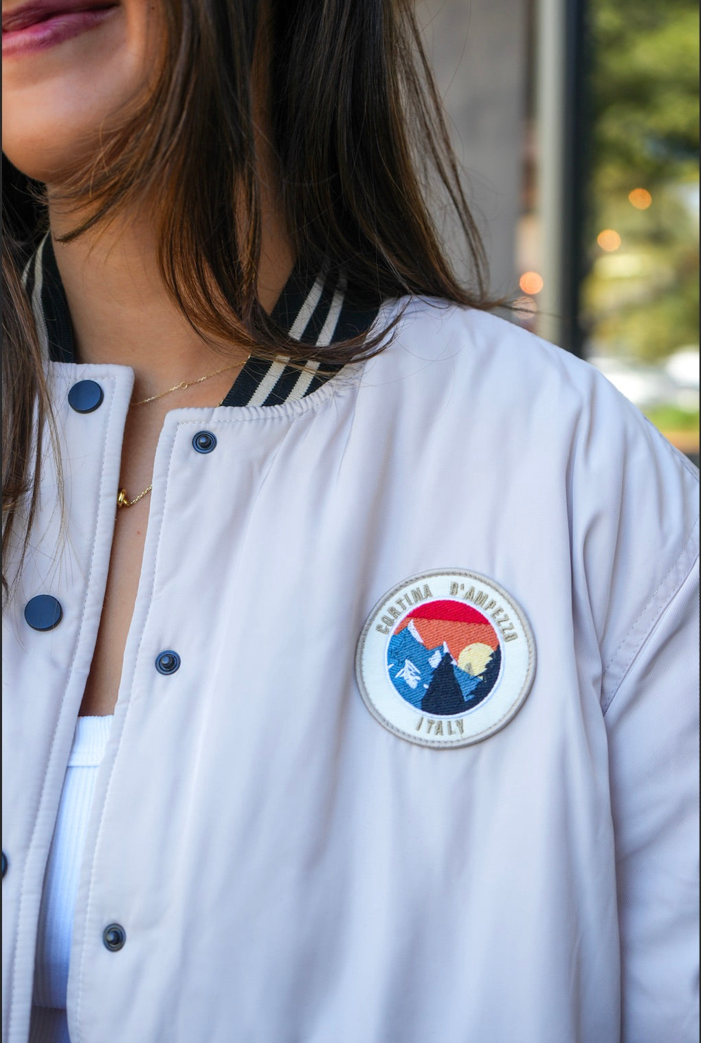 SATIN BOMBER w/PATCH IN SHORT BREAD FRONT VIEW CLOSE UP