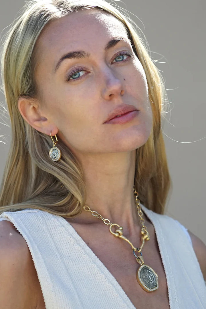 Molat horse bit necklace in gold with silver coin side view