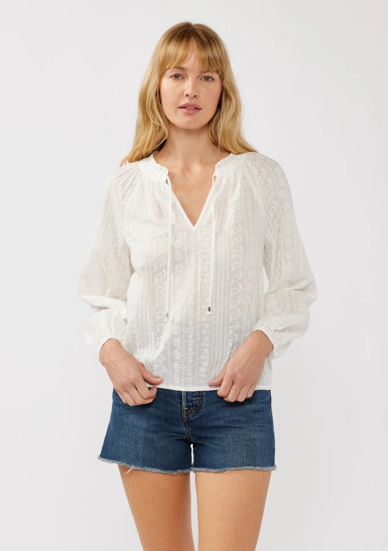 Long sleeve floral v split neck blouse in white front view