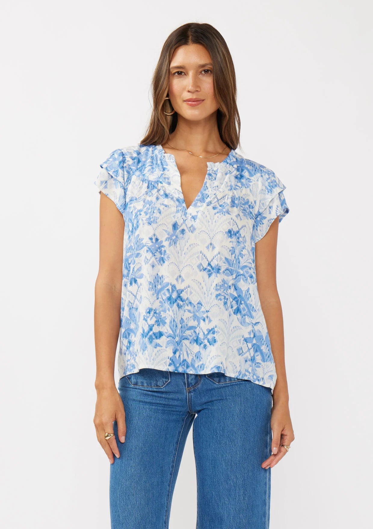 Double ruffle sleeve split neck top in off white and dusty blue front view