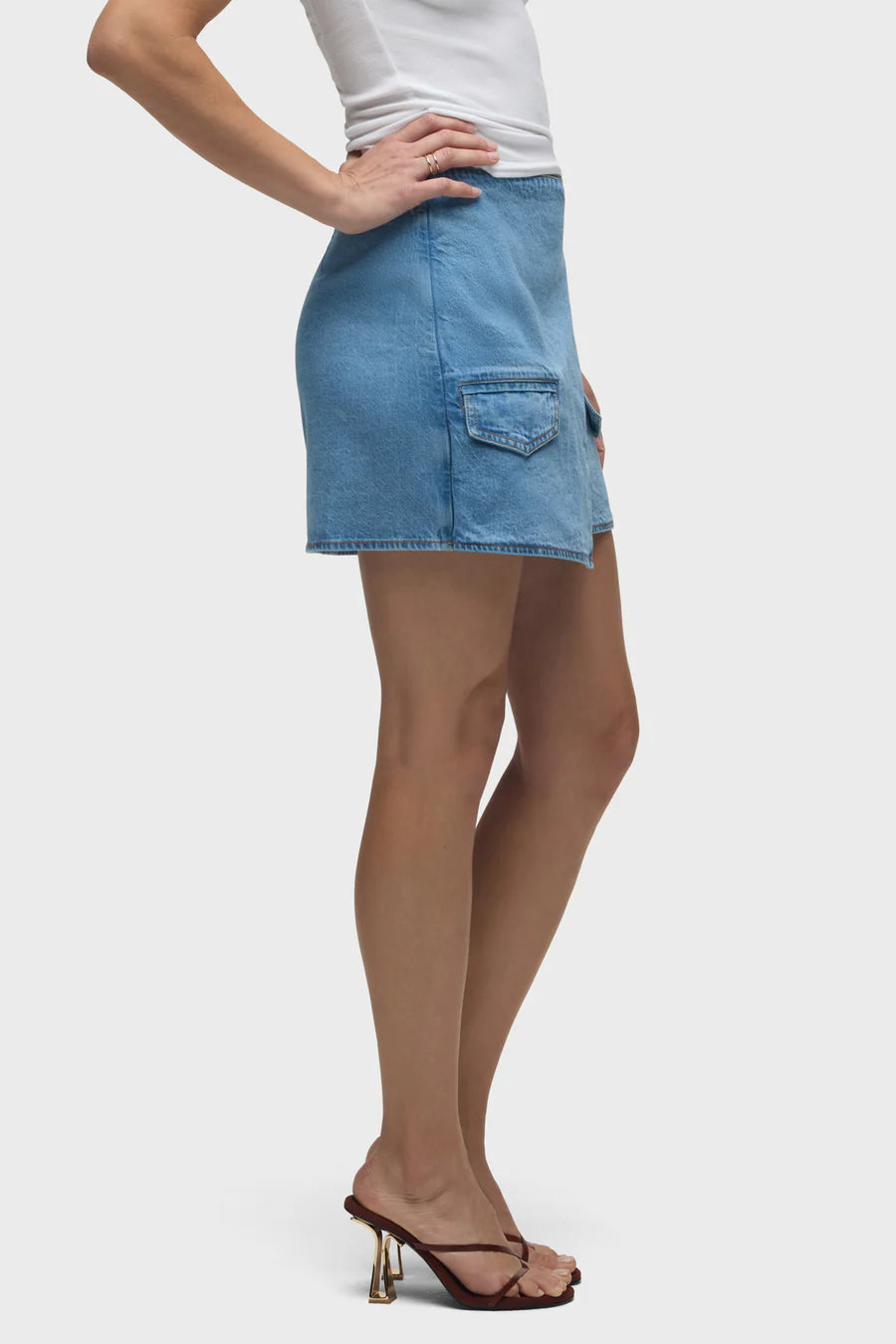 The Mountain Wrap Mini Skirt in mountain side view