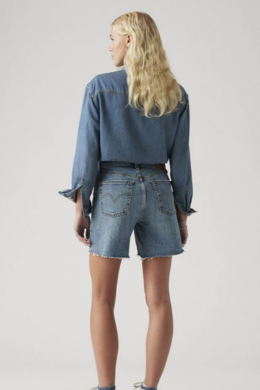 501 Mid Thigh Short, back view, ODEON denim wash, frayed hem, patch pocket