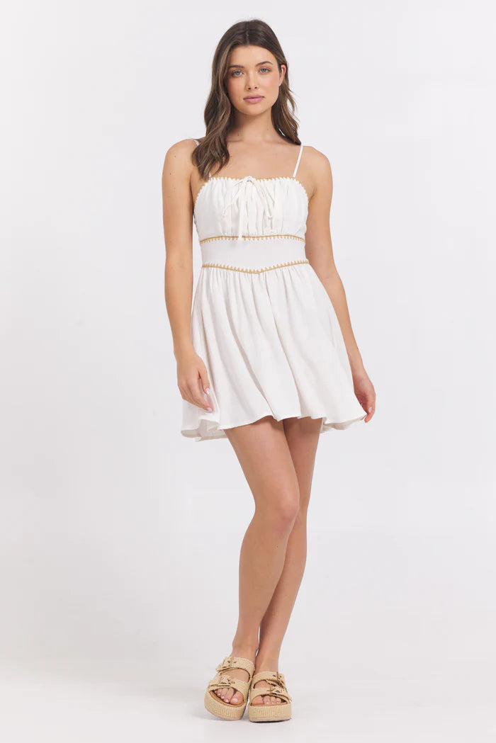 Mini dress with whip stitch in white front view