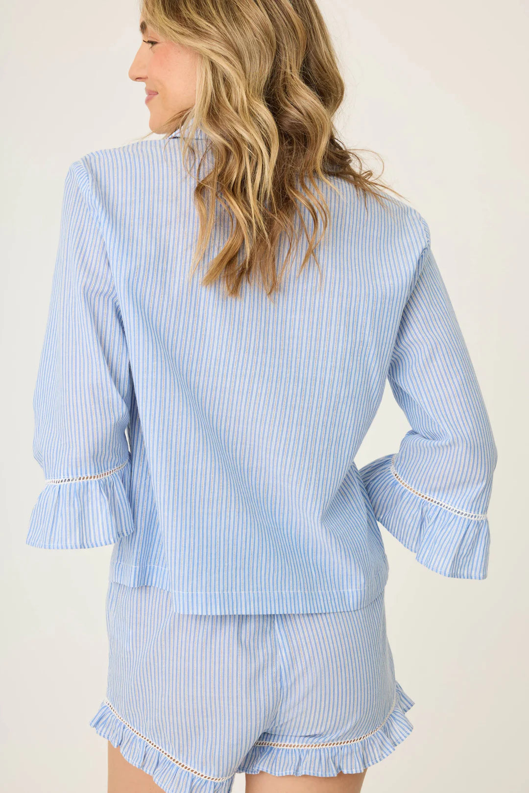 DAINTY DAISY LONG SLEEVE TOP IN BRIGHT BLUE BACK VIEW
