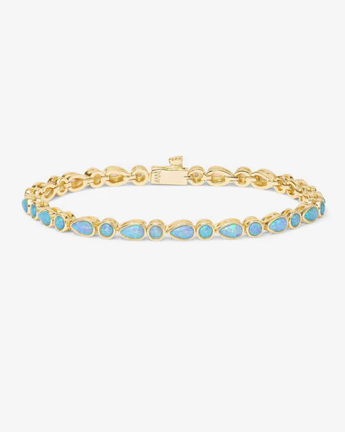 Isla tennis bracelet in gold with blue opal gems