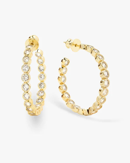 Baroness 1.25" hoop earrings in gold with white diamonds