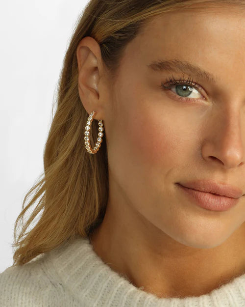 Baroness 1.25" hoop earrings in gold with white diamonds style view