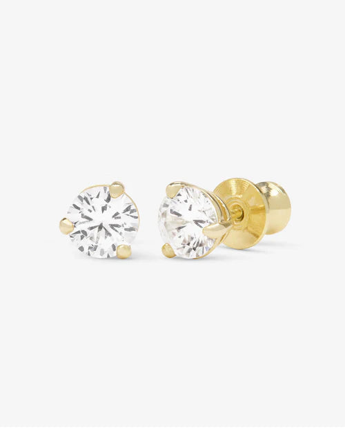 Not your basic 6mm stud earrings in gold with white diamonds