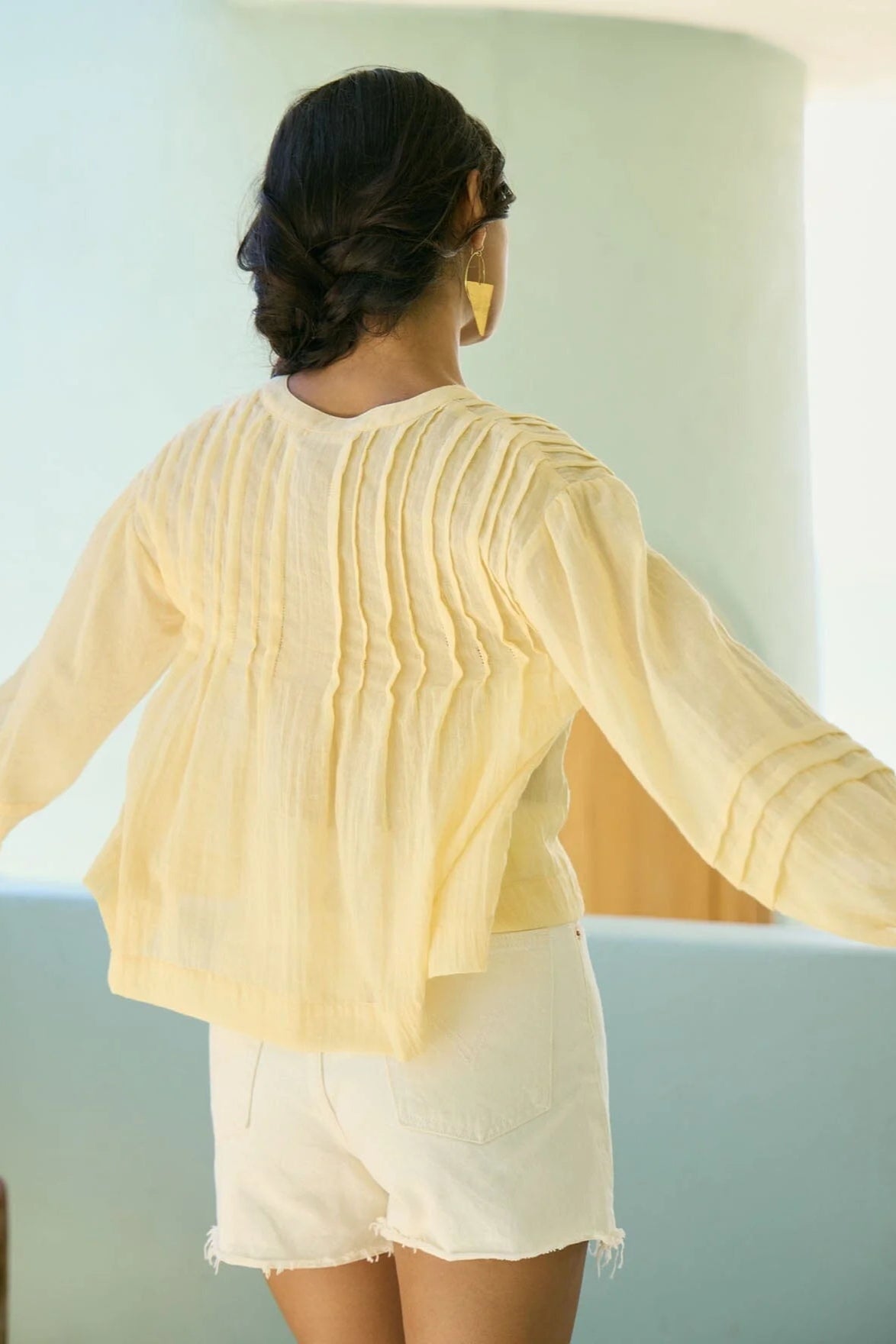 Sunshine yellow blouse with pintucks, long sleeves, back view