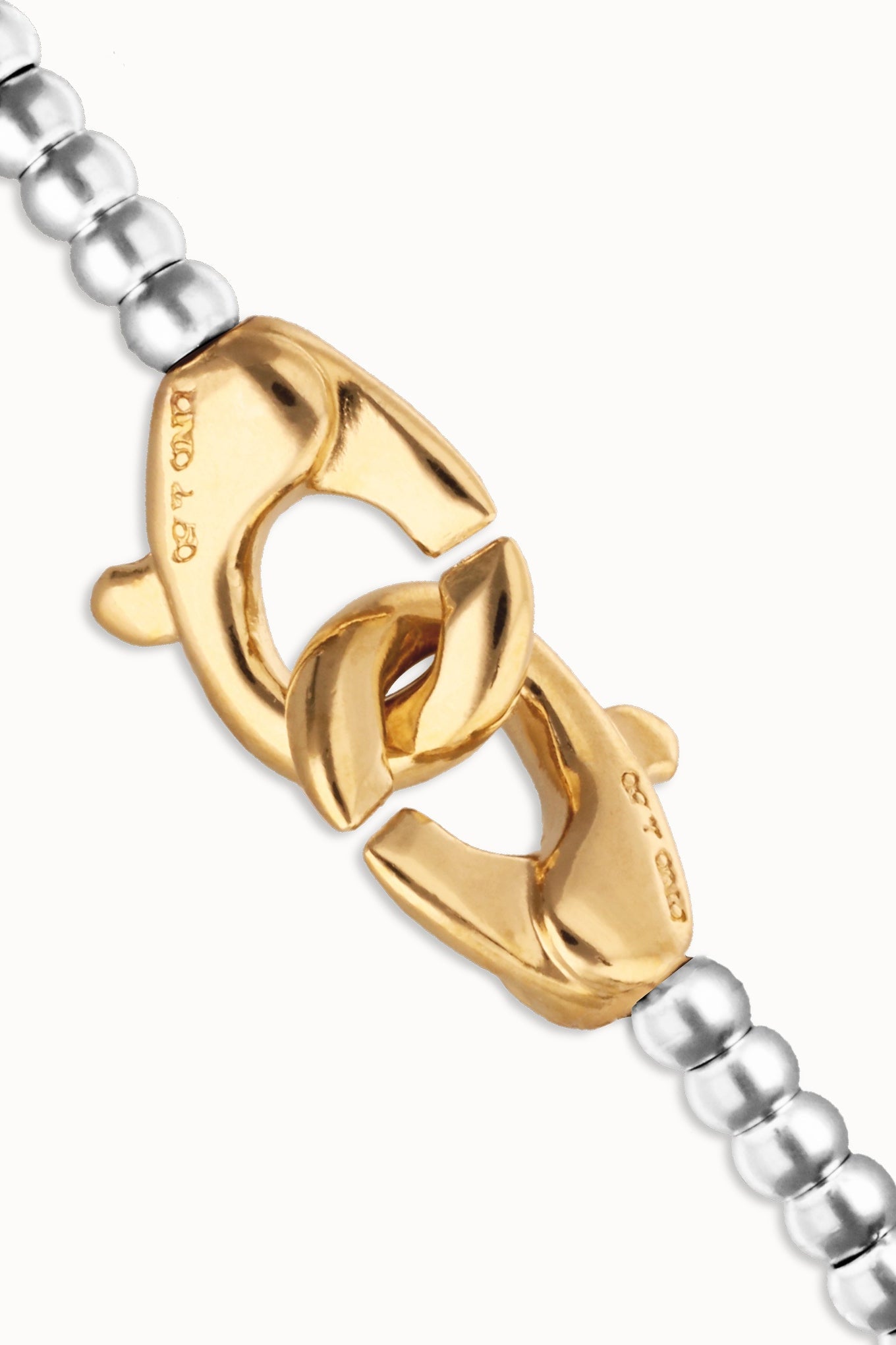 SER INSEPARABLE BRACELET IN GOLD AND SILVER CLOSE UP VIEW