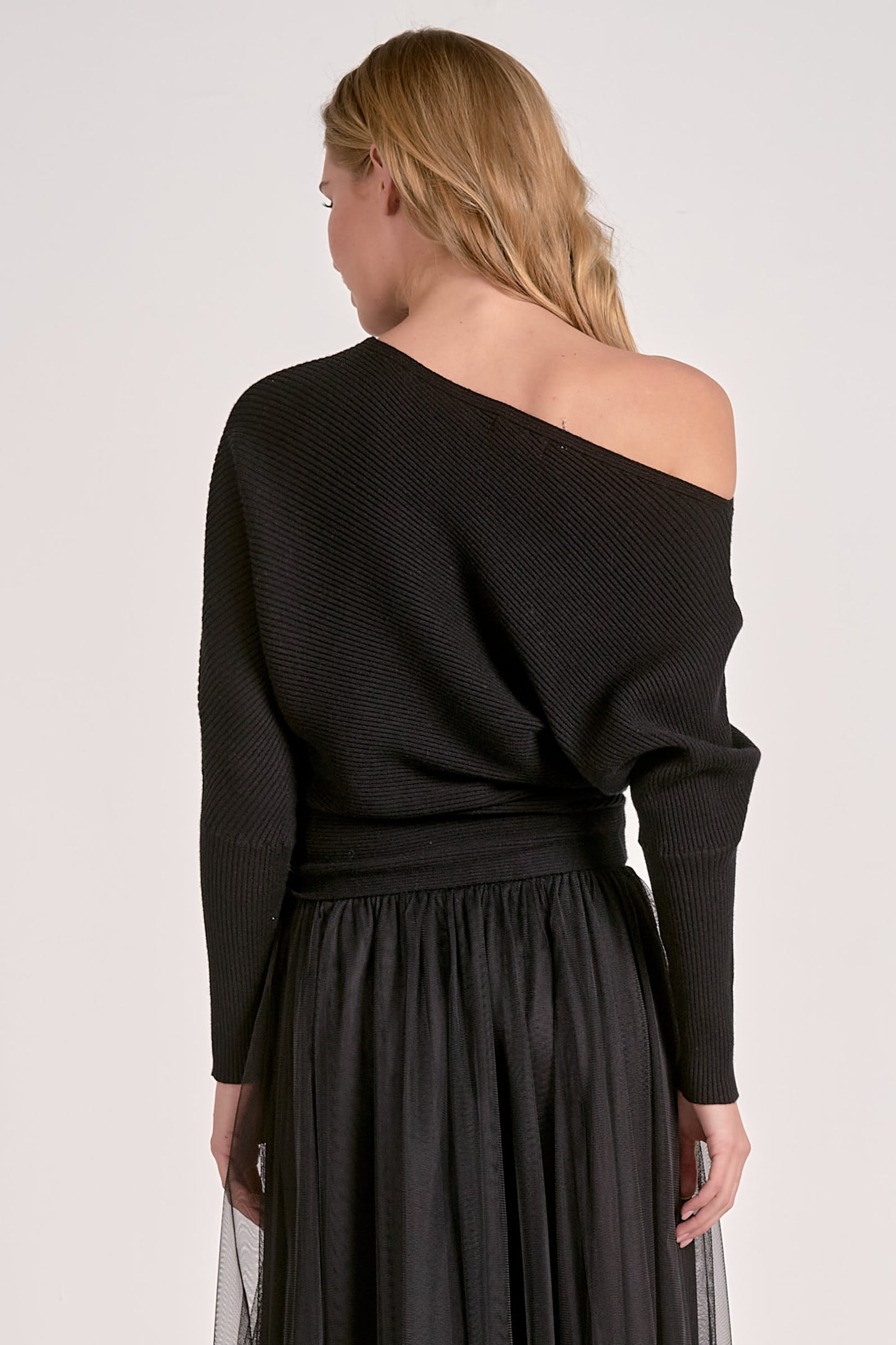 OFF SHOULDER SWEATER IN BLACK BACK VIEW
