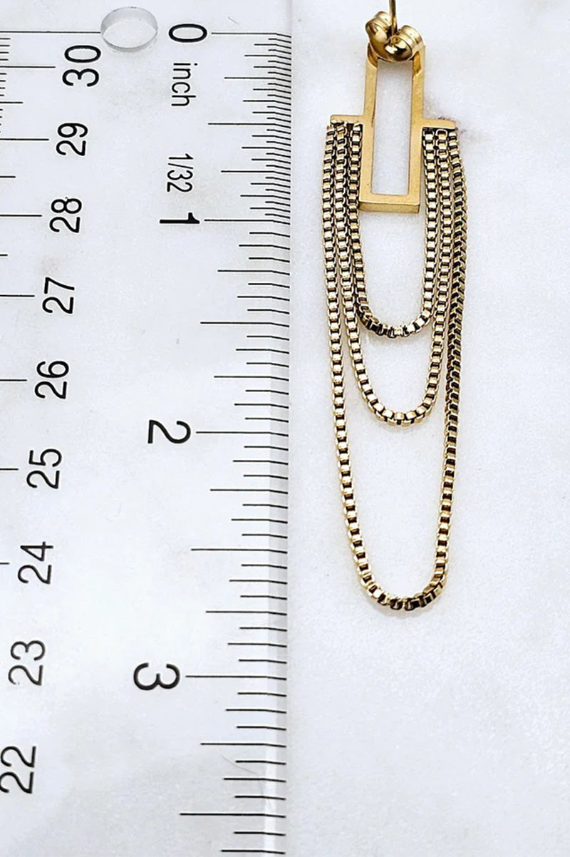 Three draped chain earrings in gold showing length as 2 and 3/4.