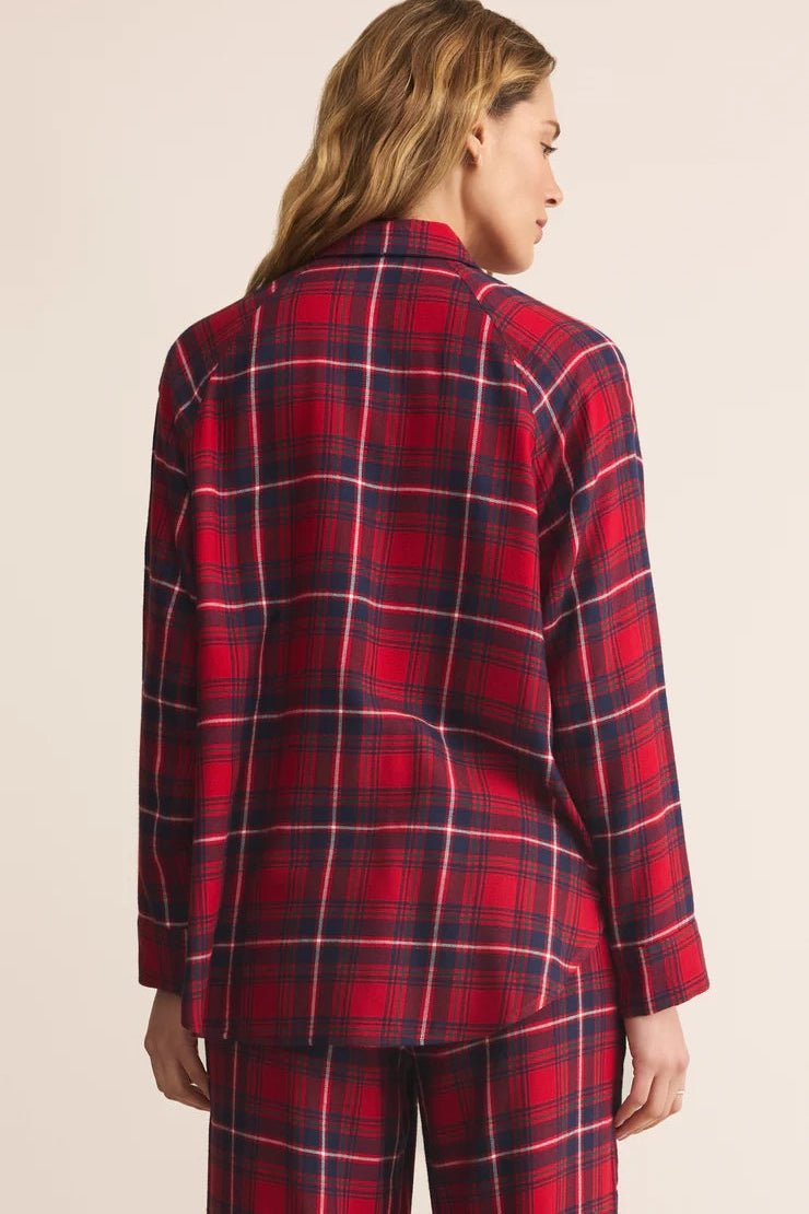Women’s plaid button-up shirt in red with navy lines, long sleeves, back view