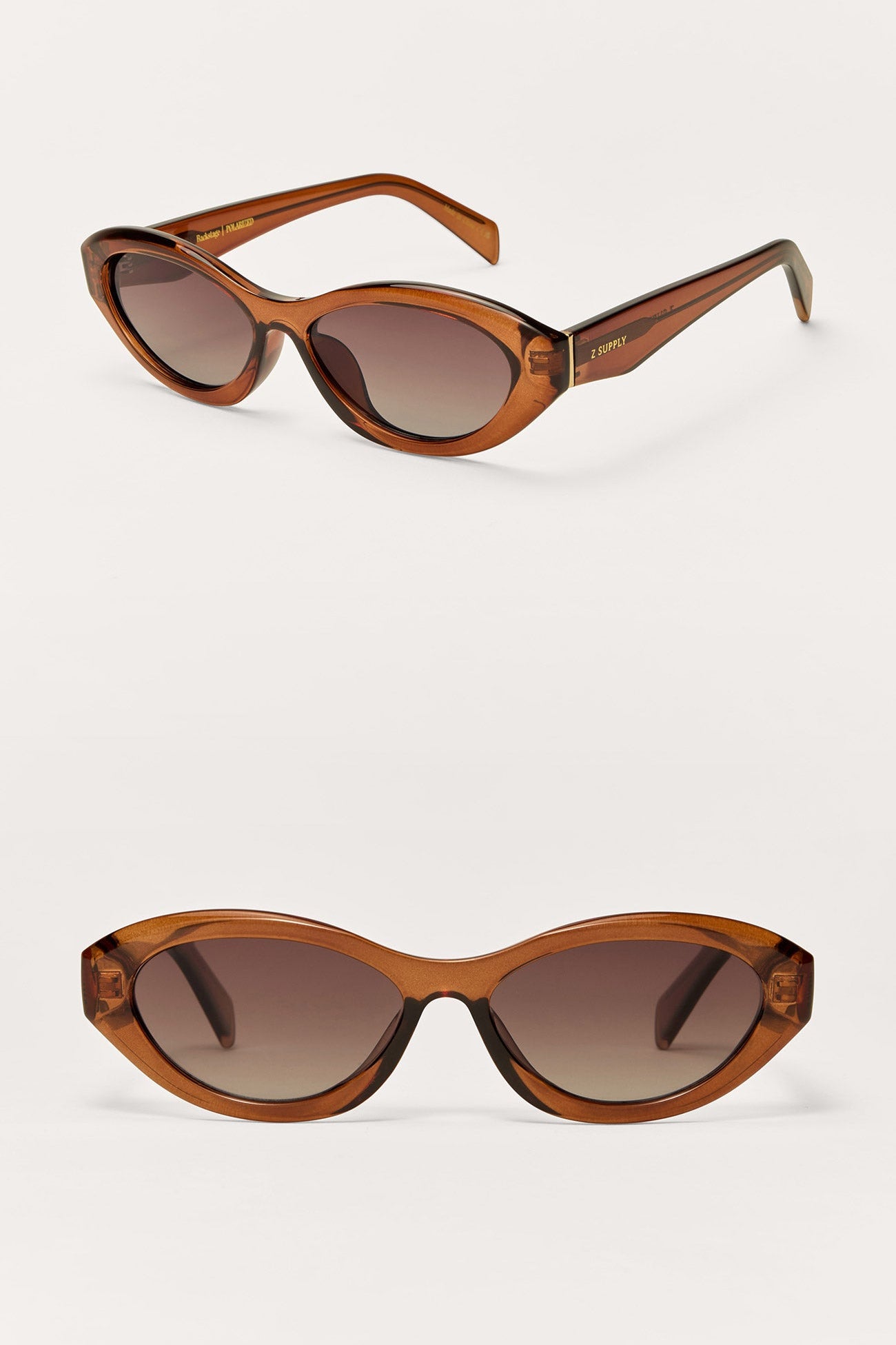 Caramel gradient sunglasses with dark oval lenses and curved arms
