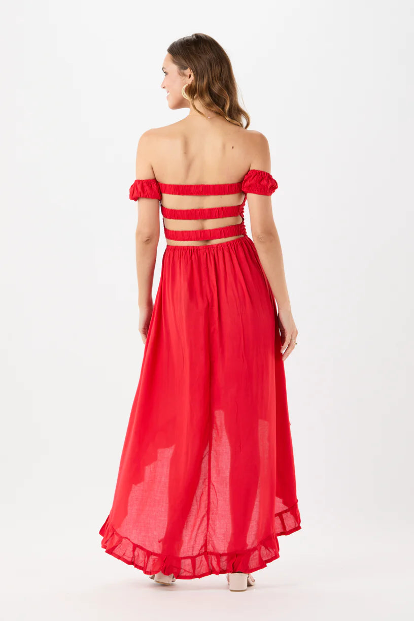 Red off-shoulder maxi dress with crisscross back straps and tiered hem