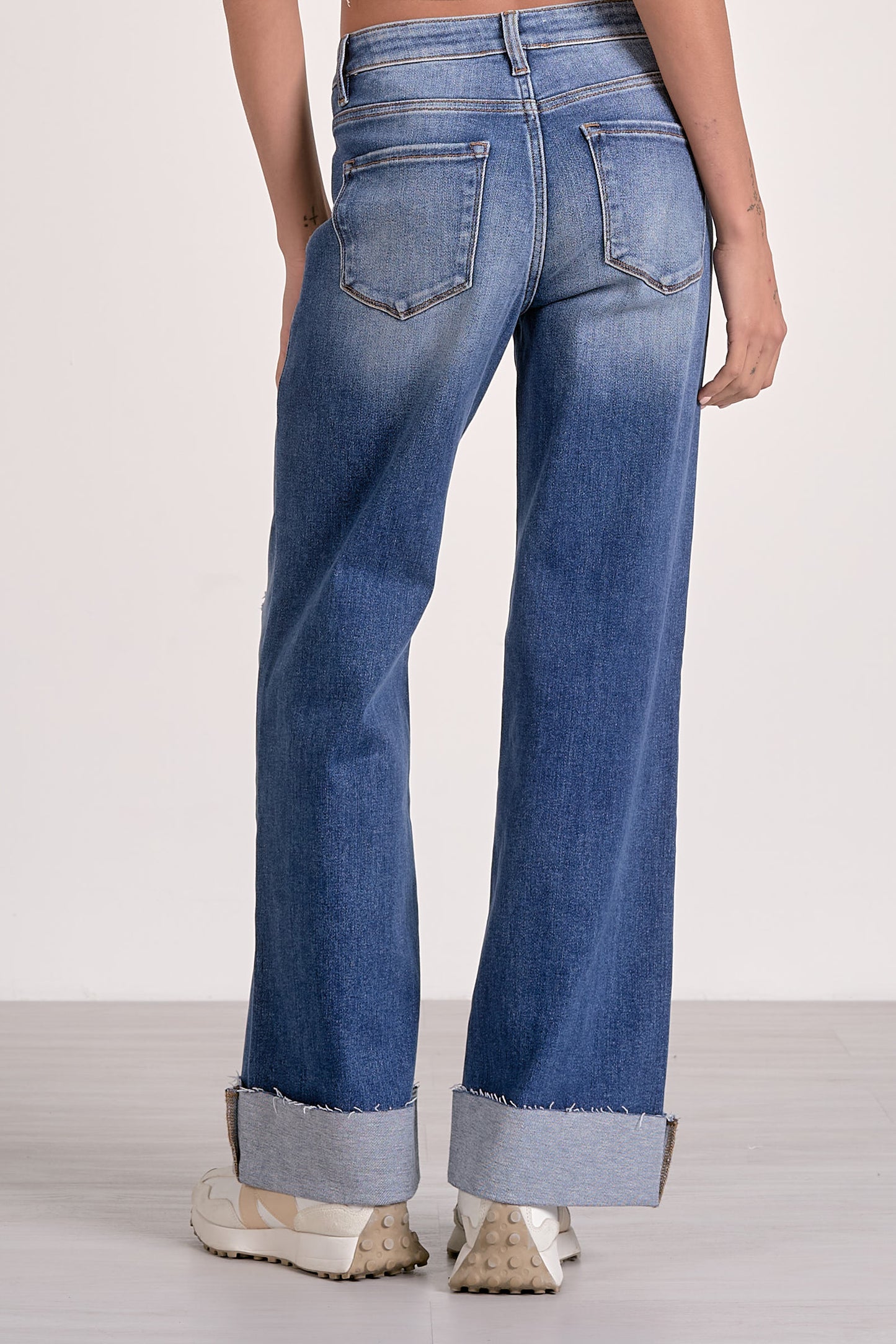 CUFFED BOTTOM JEANS IN DENIM WASH BACK VIEW