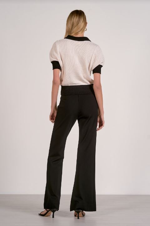 3/4 sleeve off white and black sweater back view