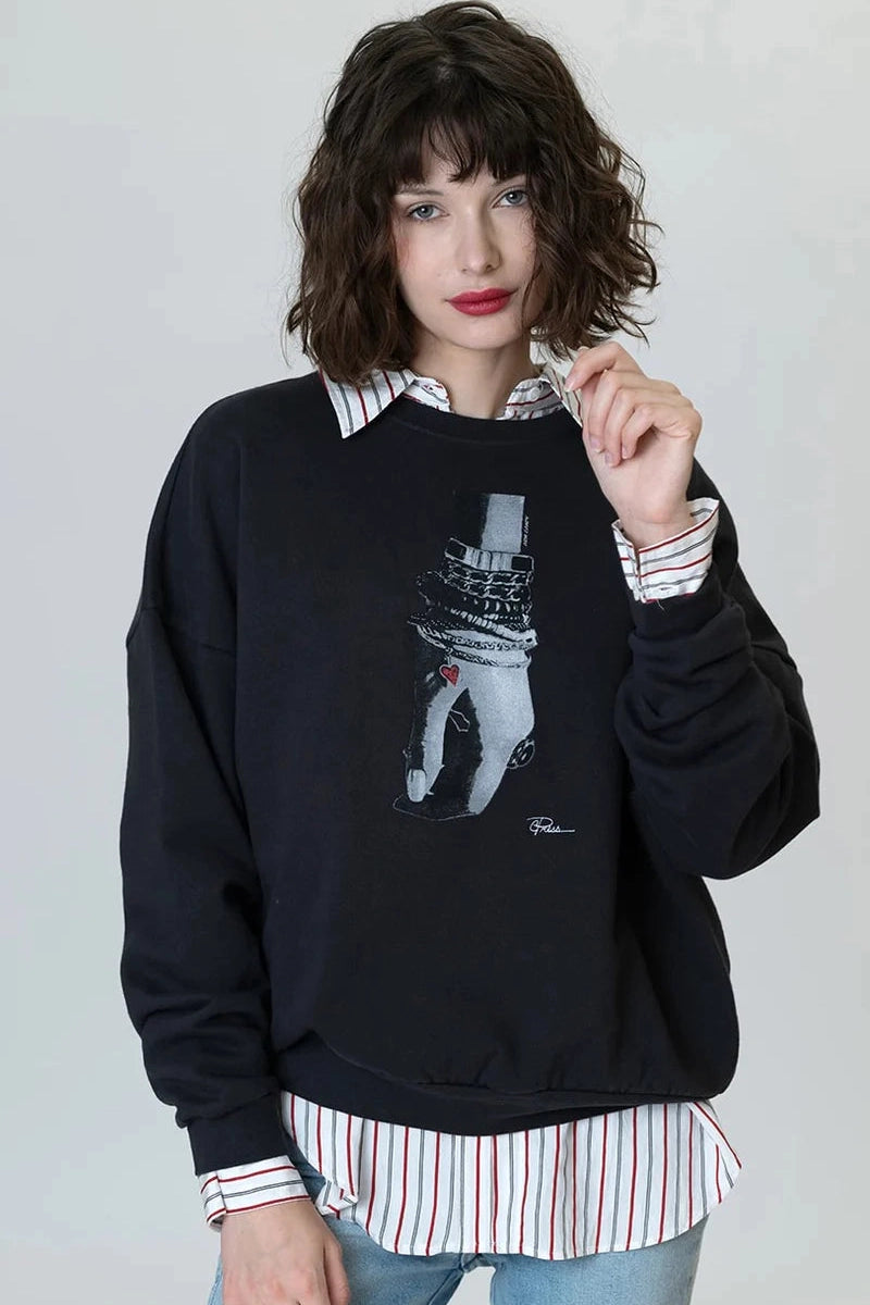 Arm Candy cozy sweatshirt in dark with front graphic and striped cuffs and hem