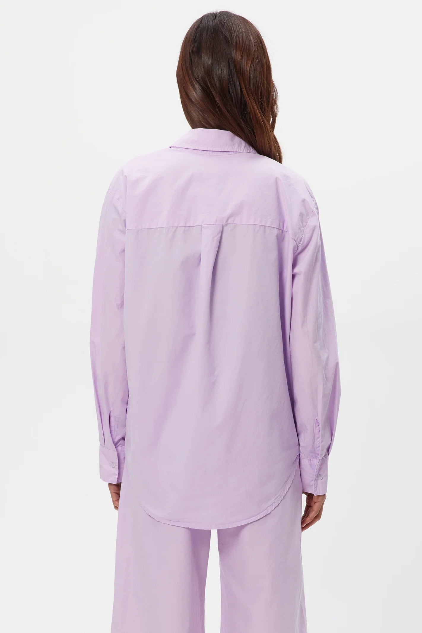 Lavender buttondown shirt back view with yoke seam and long sleeves