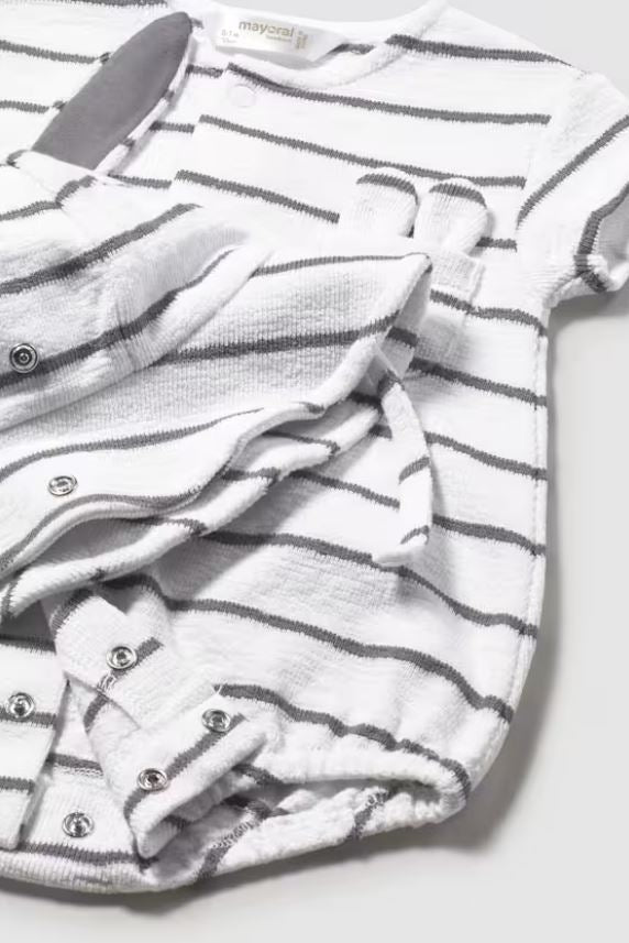 Newborn romper and hat set in whiteboard detail view