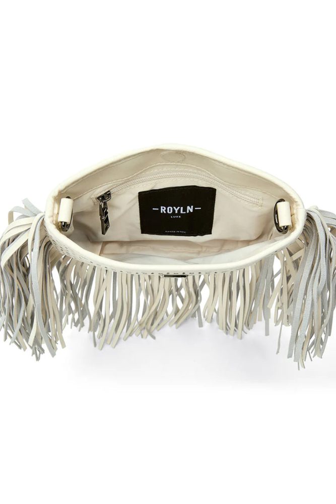 Free spirit fringe saddle bag in cream perferated leather inside view