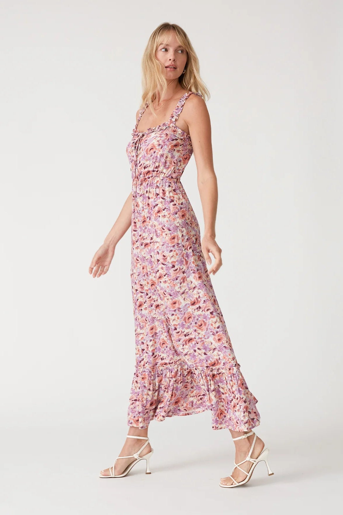 Side view floral maxi dress with adjustable ruffle straps and tiered skirt, dusty tones
