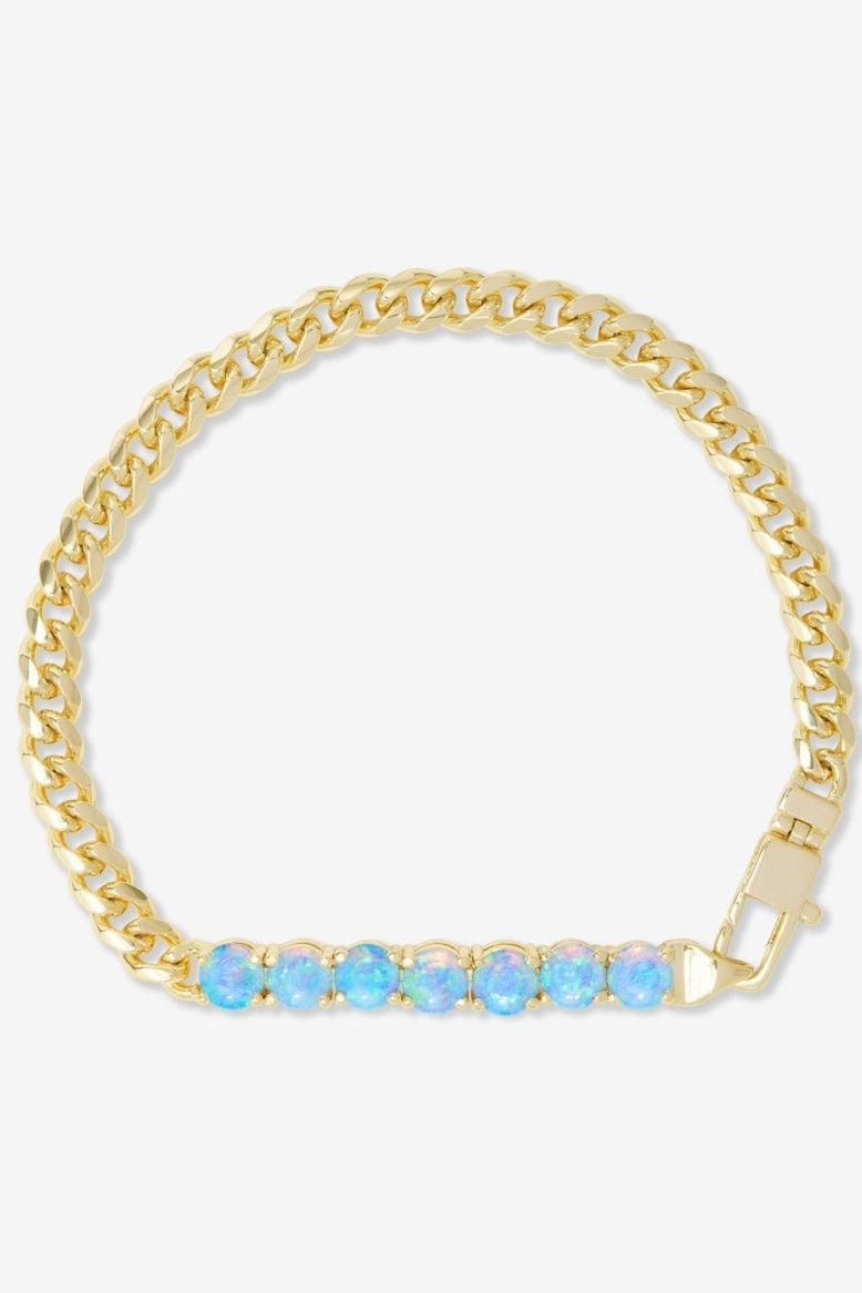 Gold chain baby bracelet with row of light-blue opal-style stones and clasp
