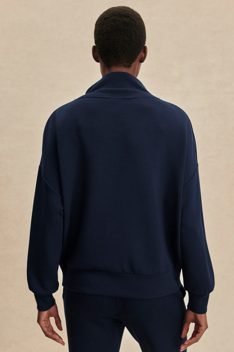 Navy half-zip sweatshirt, back view with stand collar and full-length sleeves