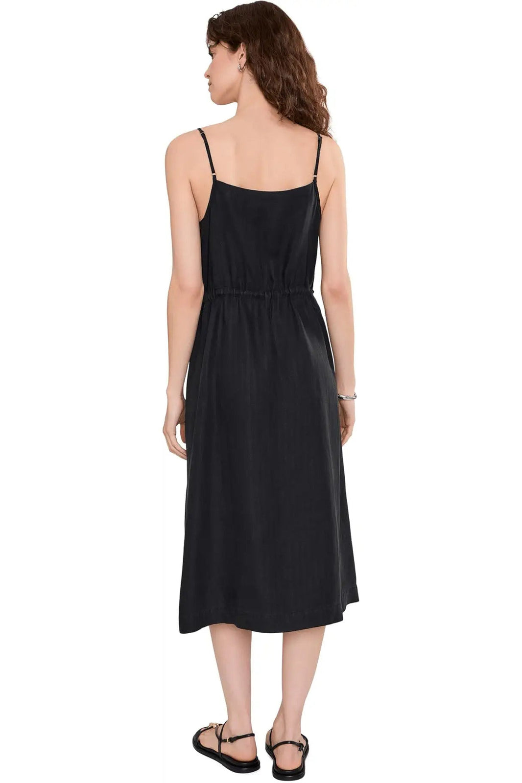 Back view of black midi dress with spaghetti straps and gathered tie waist