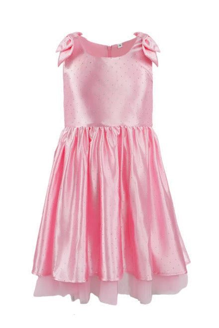 Pink sleeveless birthday dress with bow shoulder details and gathered skirt