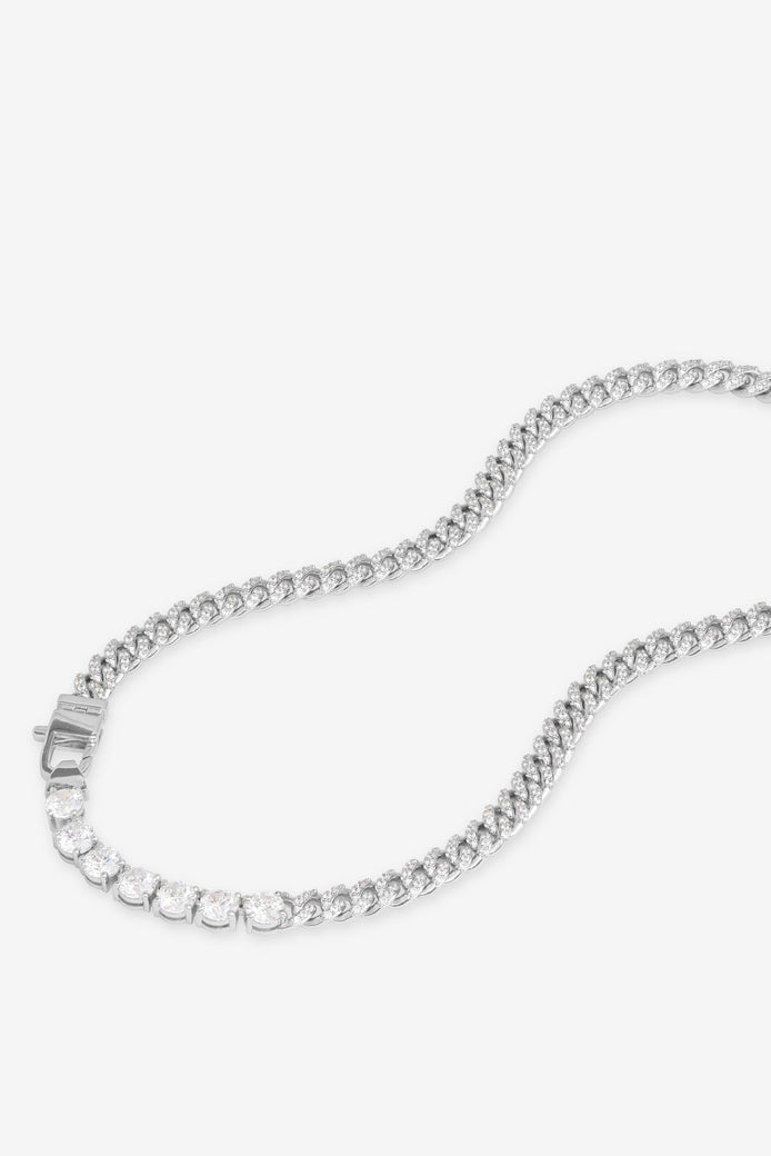 Silver-tone tennis necklace with white pavé stones and square link clasp