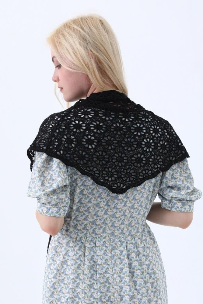 Black boho crochet lace shawl, back view with dense circular openwork pattern