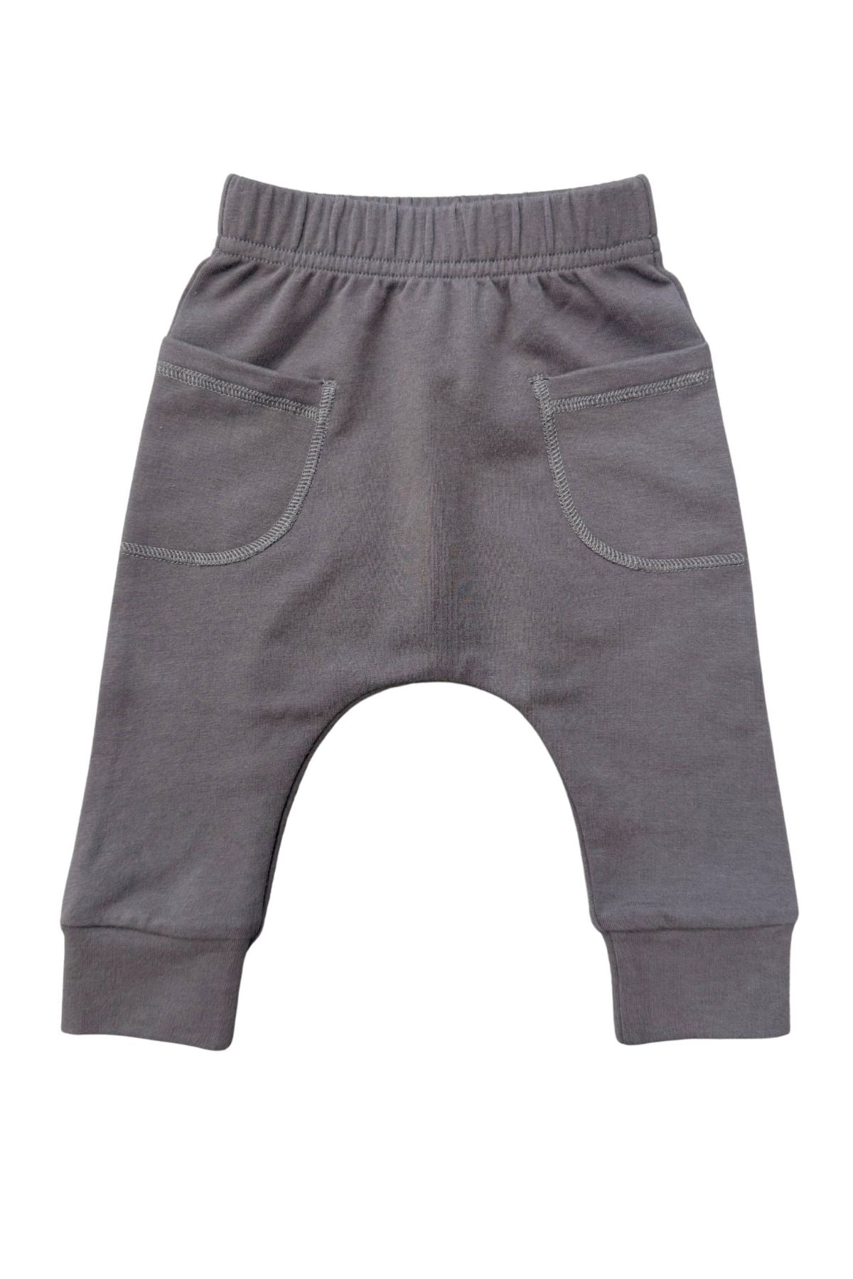 A pair of toddler's tornado gray knit pants with an elastic waistband, side pockets, and a leg-hugging leg design, shown against a plain white background.