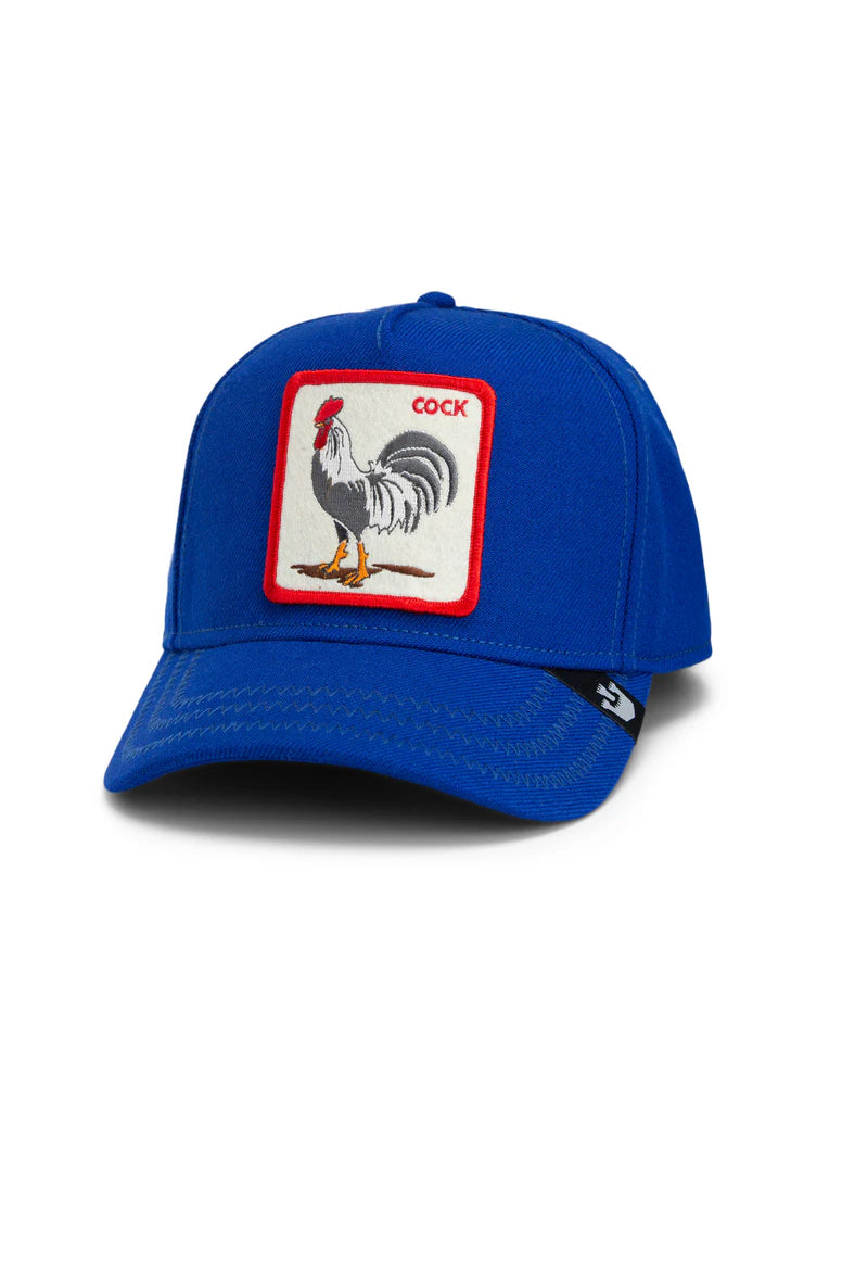 the rooster field 100 trucker hat in blue front view