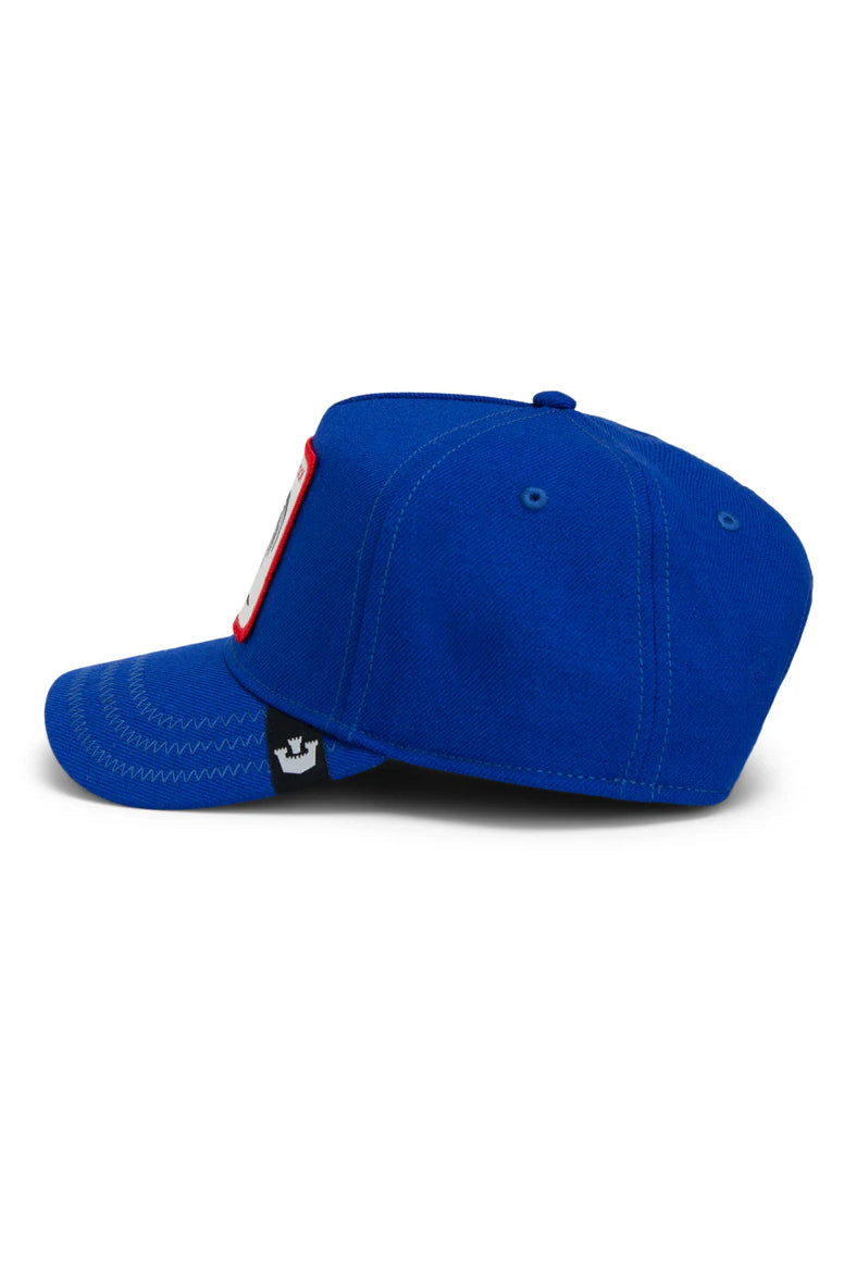 the rooster field 100 trucker hat in blue side view