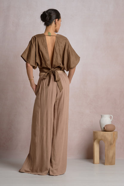 Brown crop top with open back and tie fastening at upper back