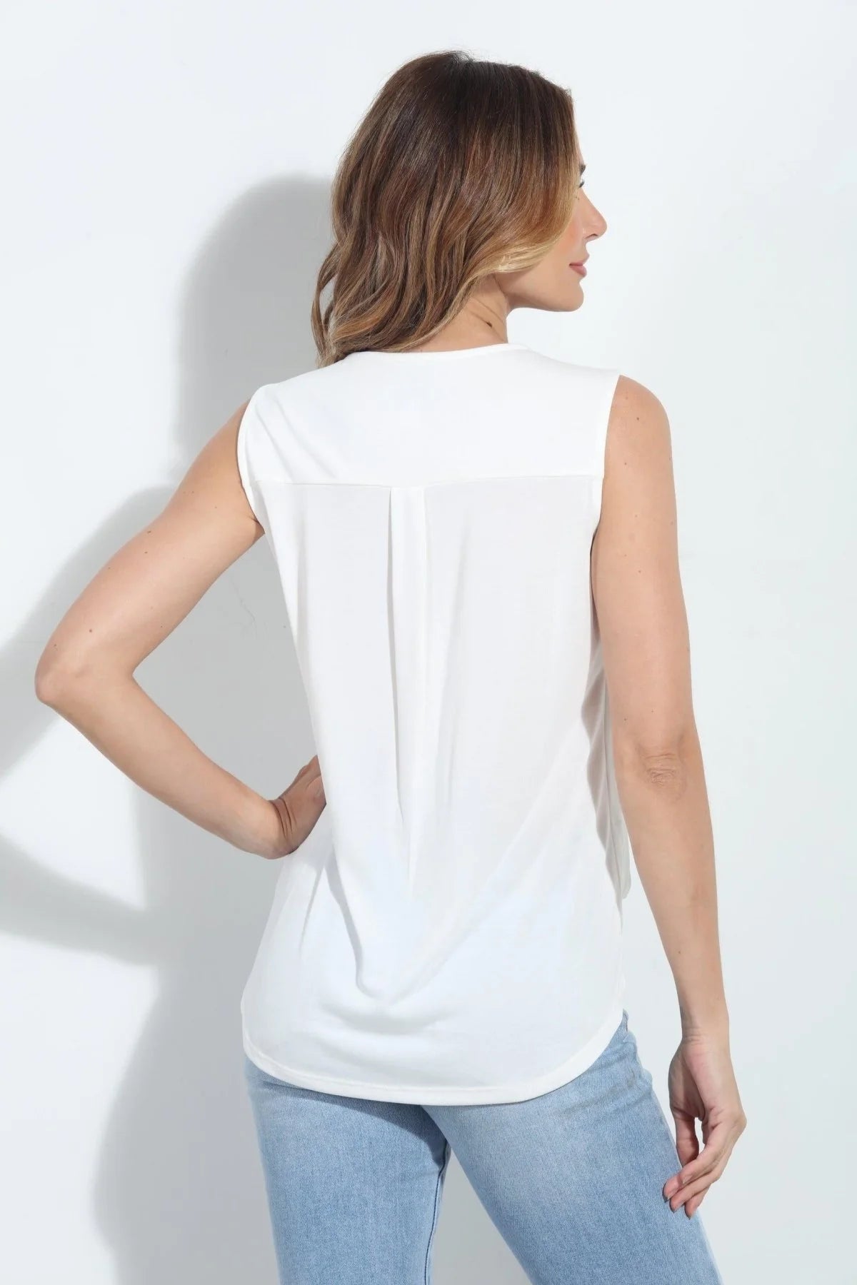 Ivory cupro surplice sleeveless top, back view with central pleat and drape